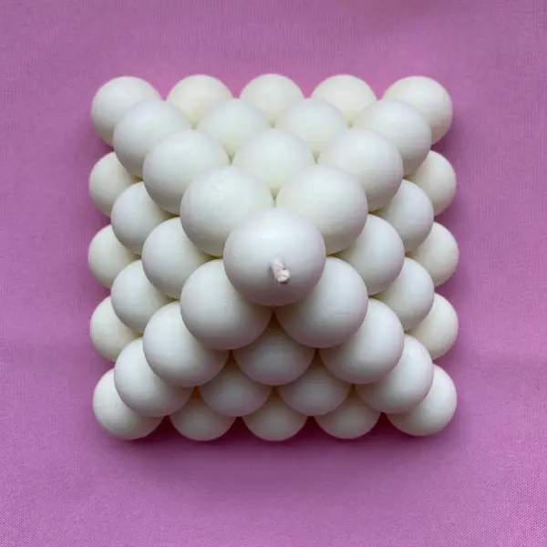 vela de soya burbuja en forma de triangulo