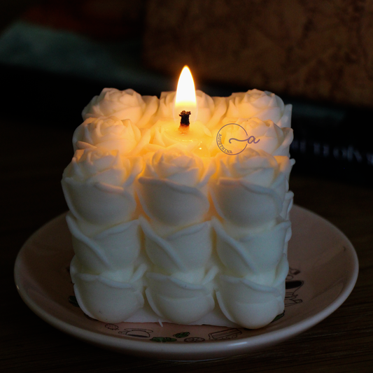 vela de soya bubbles en forma de rosas color blanca