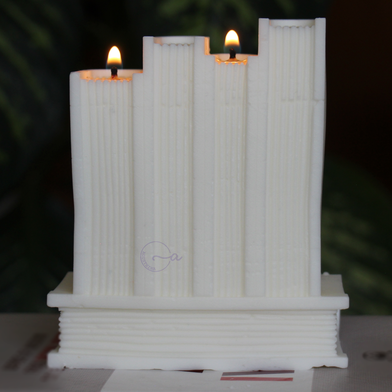 vela soya en forma de libros