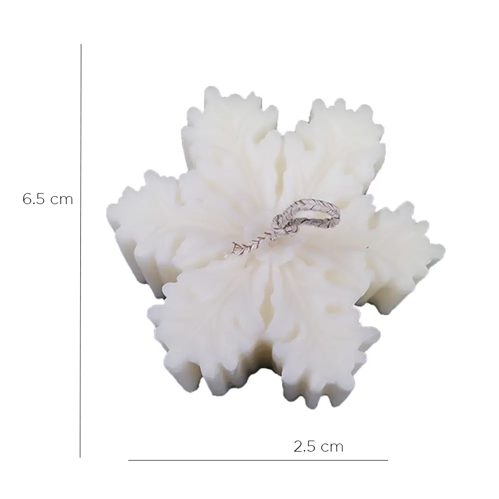 vela de soya en forma de copo de nieve color blanca